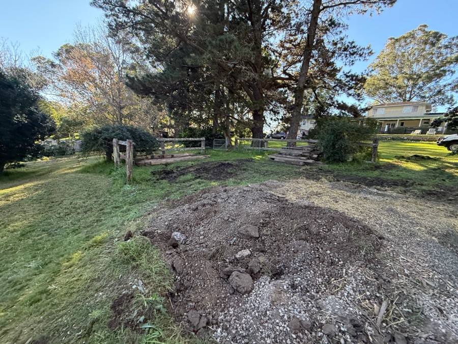 Cleared and levelled site after the asbestos shed, piers and debris were removed
