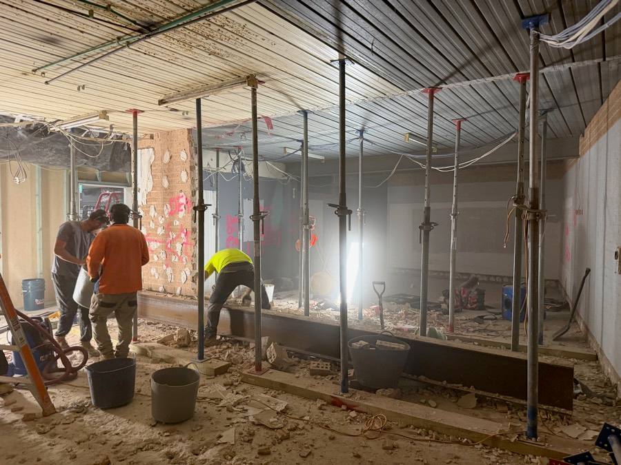 HazWreck crew on a commercial strip-out with propped ceiling and steel beams