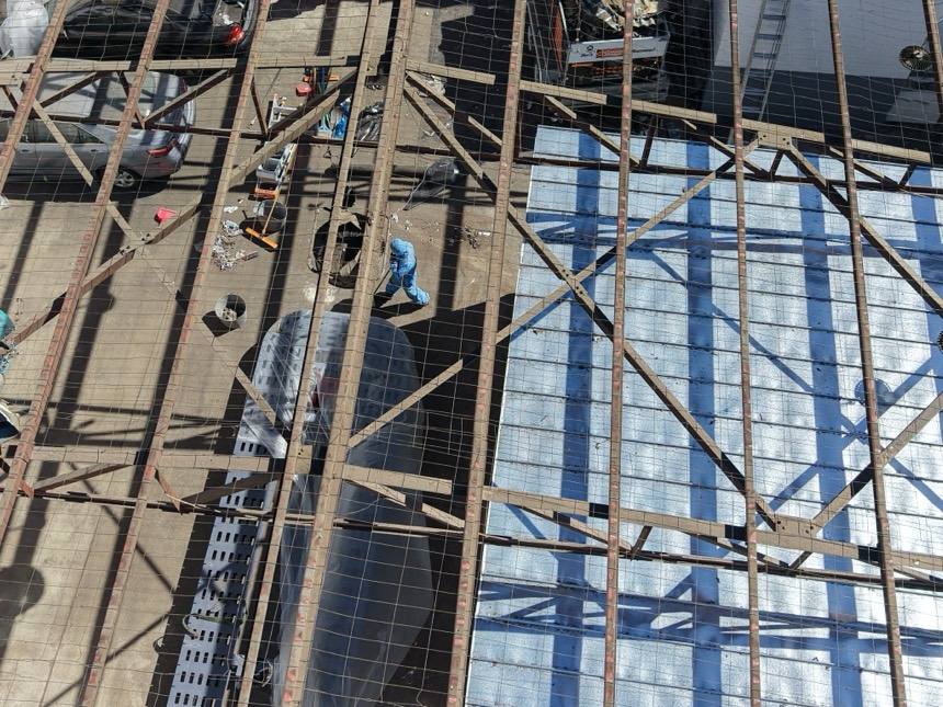 Aerial view of a HazWreck warehouse roof and structure strip with double-wrapped sheeting