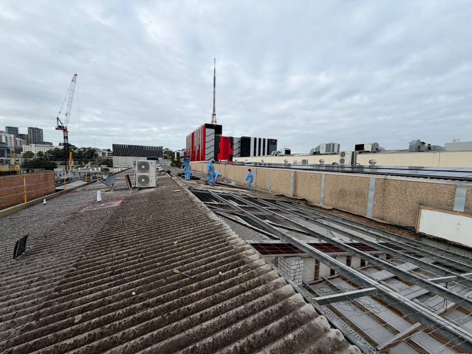 Large commercial asbestos roof removal in Artarmon