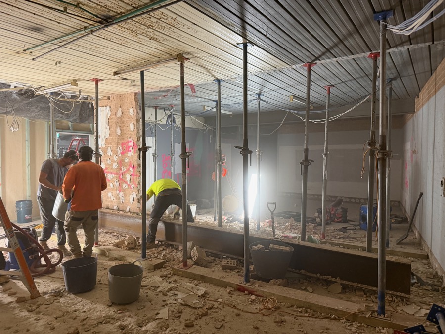 HazWreck crew on a commercial strip-out with propped ceiling and steel beams