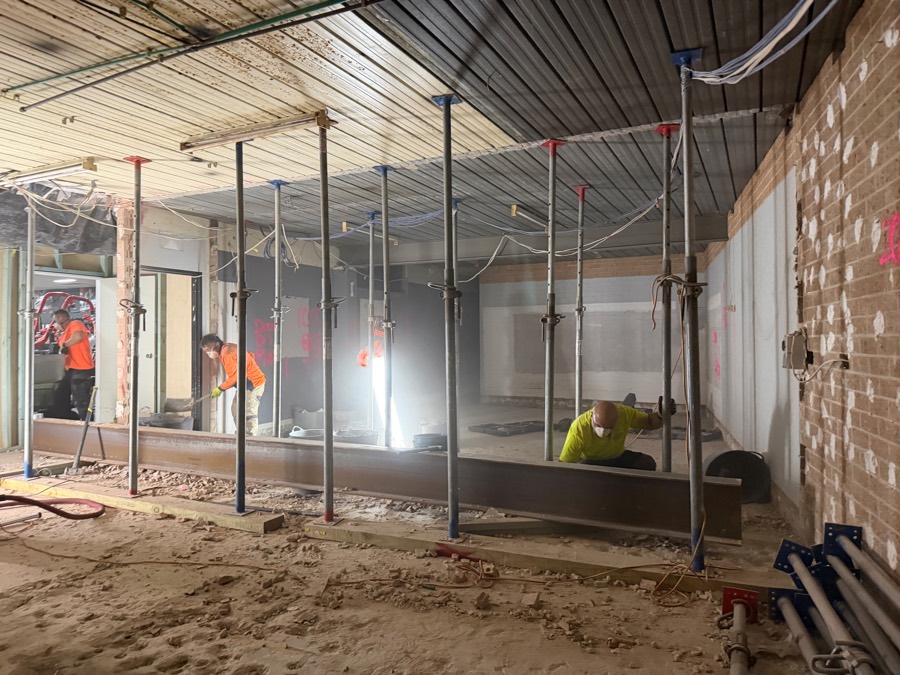 HazWreck crew on a commercial strip-out with propped ceiling and steel beams